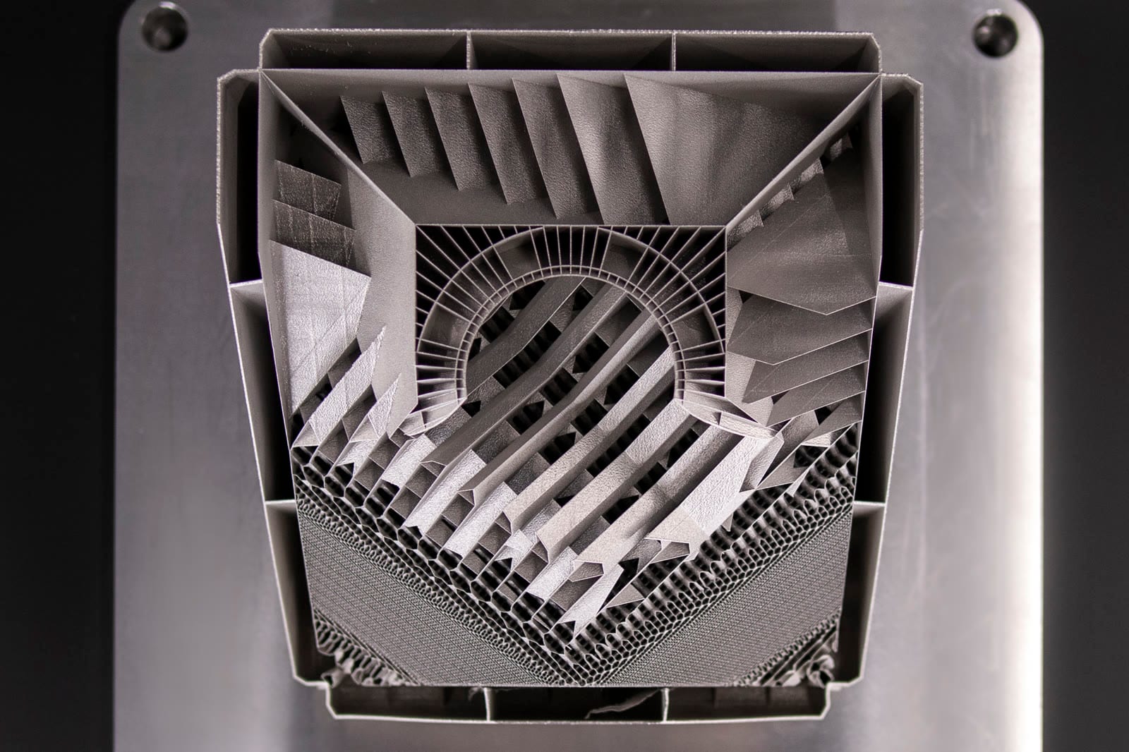 Internal channels in a stainless steel heat exchanger printed on an EOS M 400-4