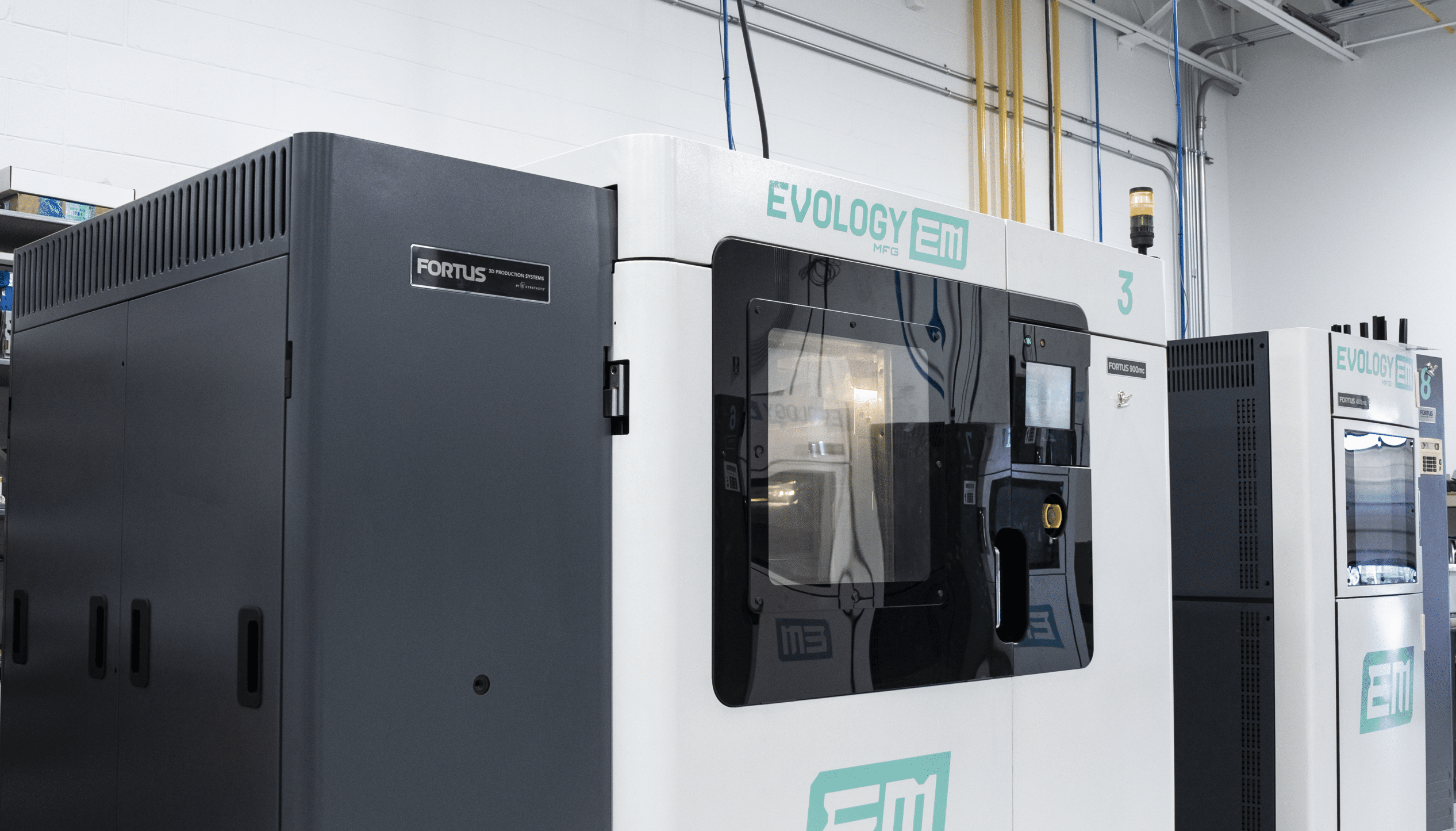 Evology Manufacturing Stratasys Fortus industrial FDM printer on the production floor