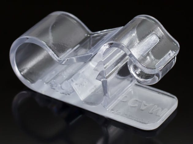 Glossy clear SLA-printed clip showing a smooth surface finish