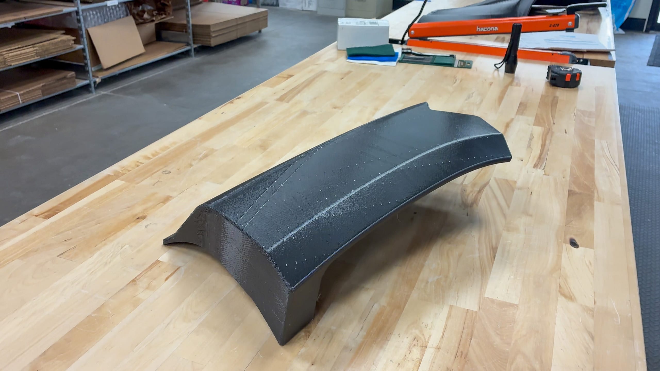 A large-format FDM-printed ASA mold section for the EuroWise Cayenne Ultra on a workbench