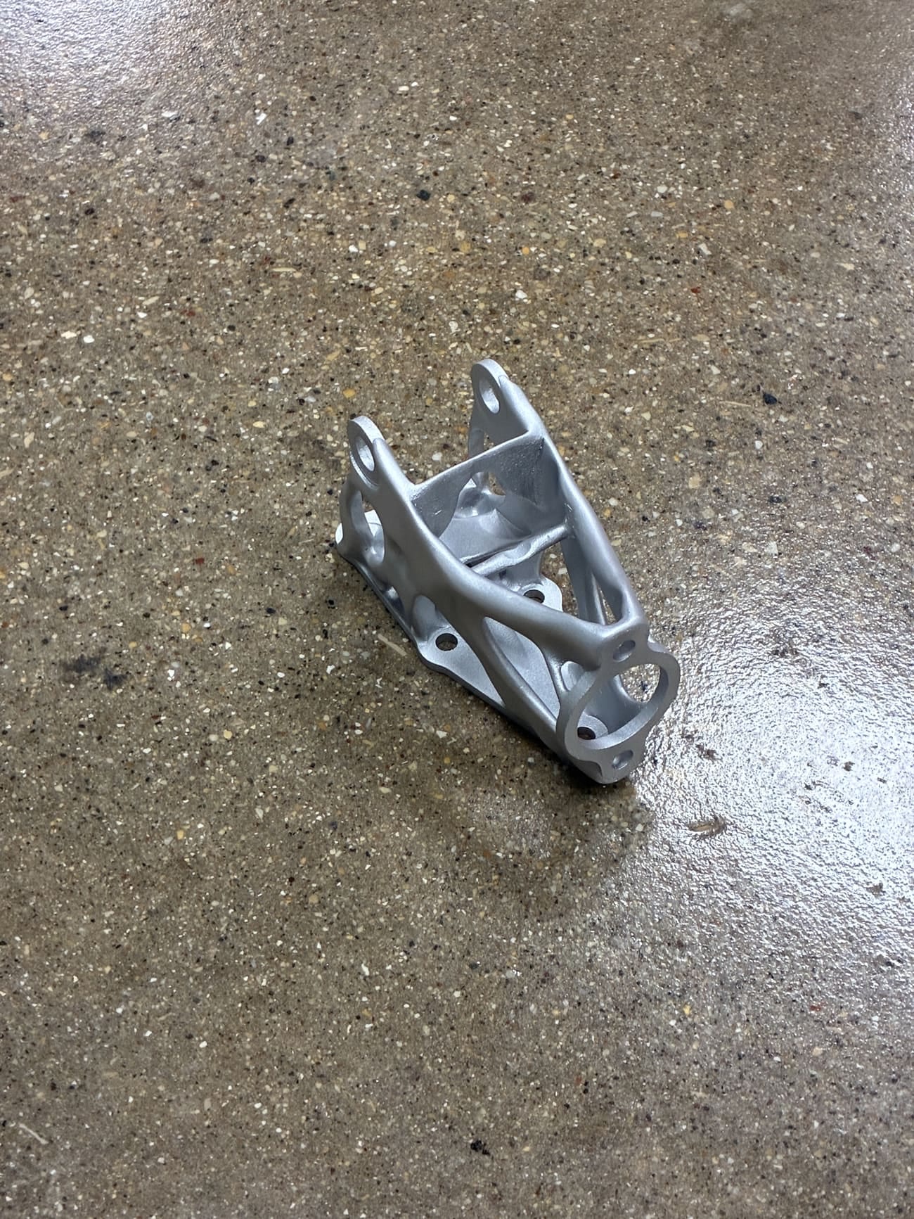 The generatively designed handbrake mount from another angle