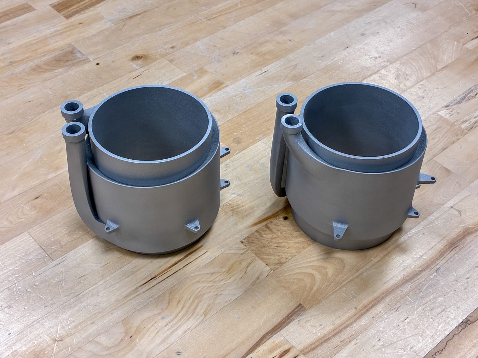 Finished DMLS aluminum motor cooling sleeves