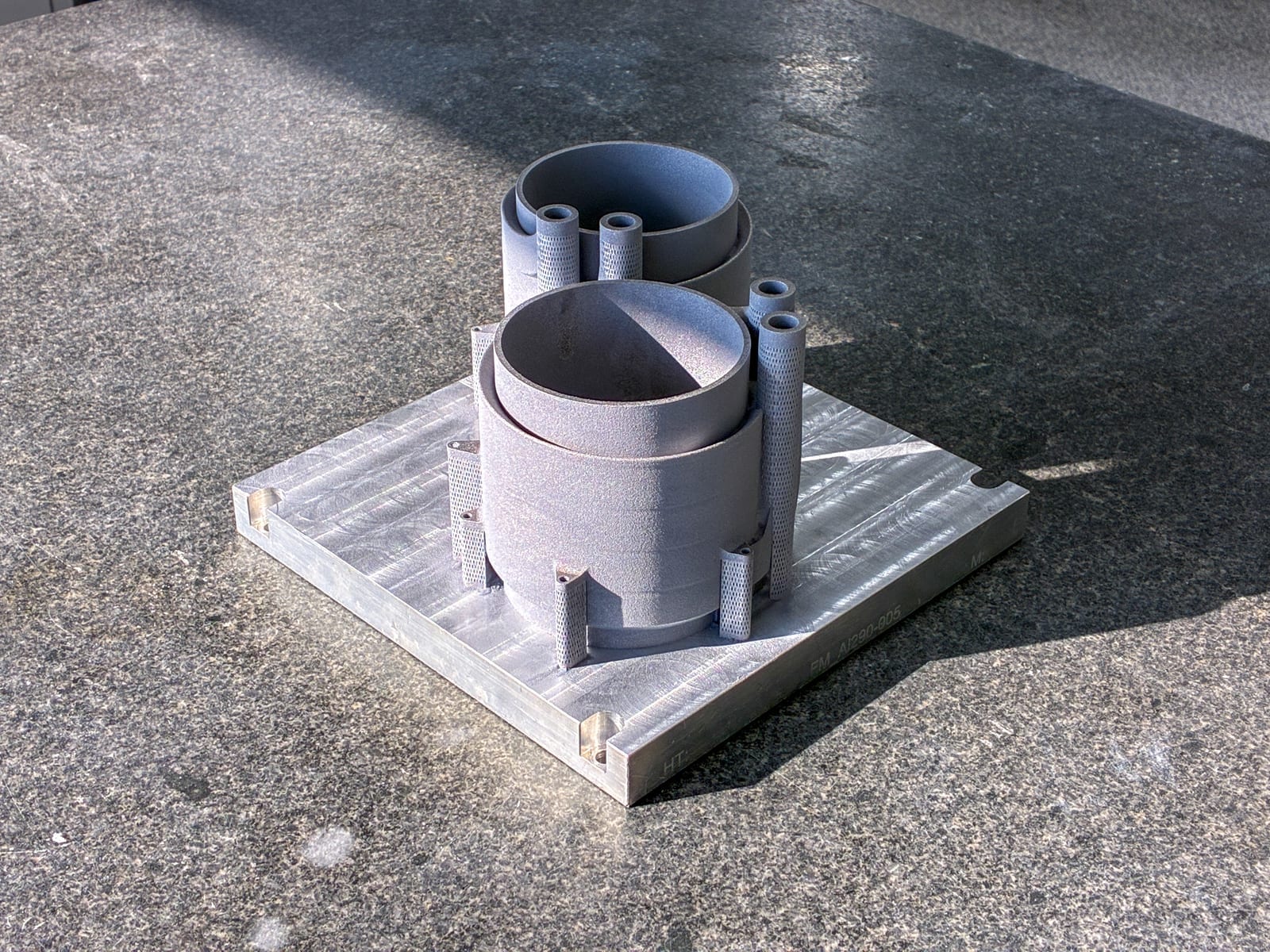 Cooling sleeves on the build plate, seen from above