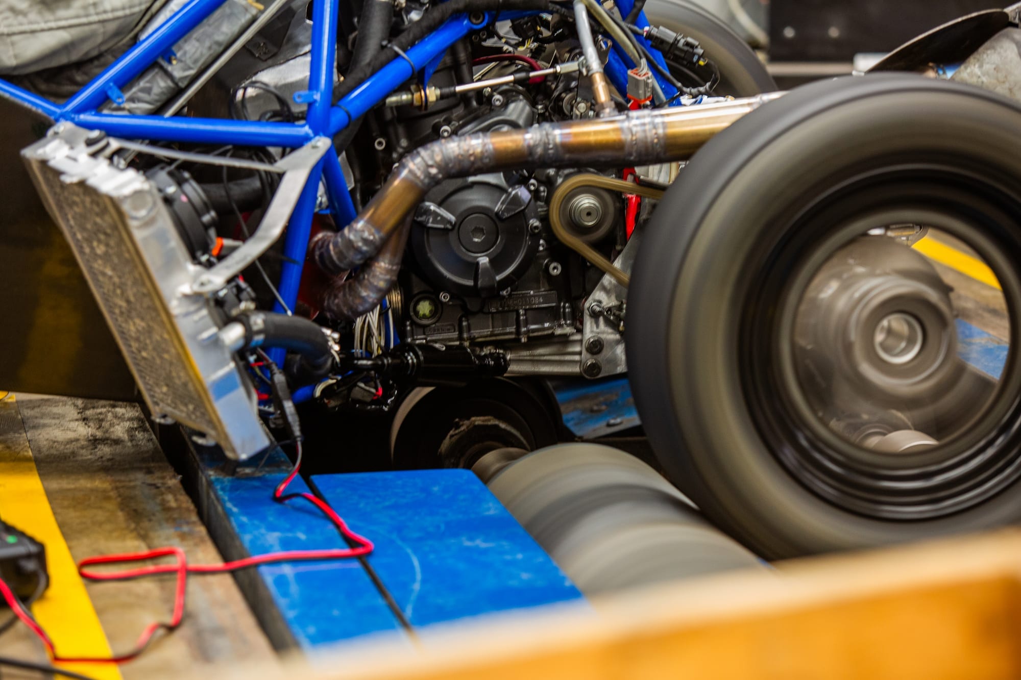 PR26 on the chassis dyno, with the Yamaha engine and oiling package under load