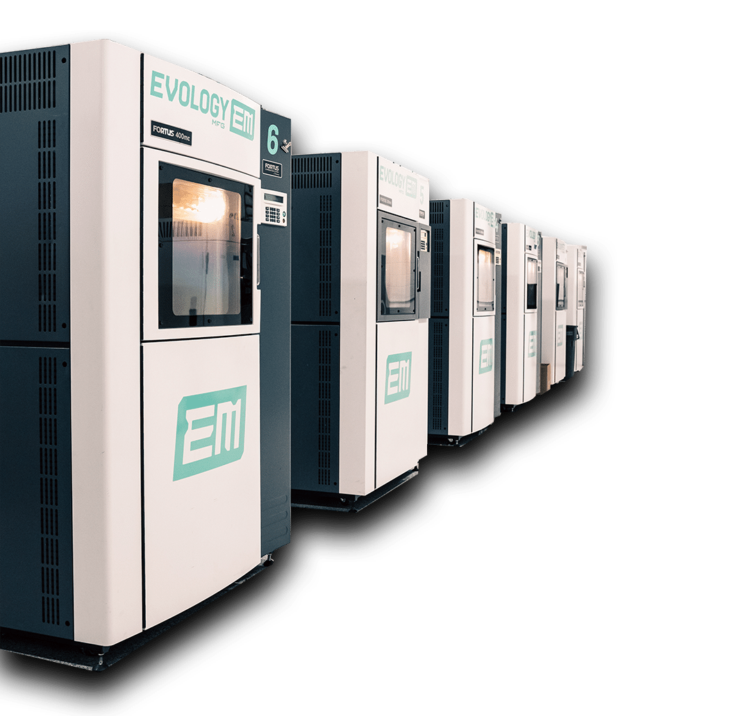 Row of Evology Fortus additive manufacturing machines on the shop floor