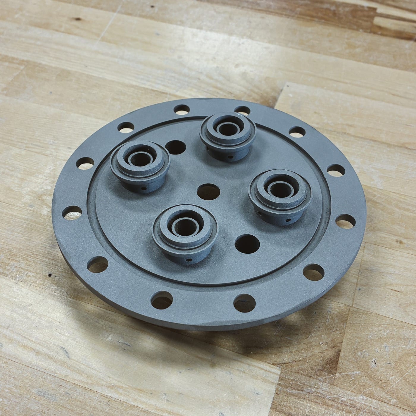 Metal 3D printed aerospace manifold with integrated nozzles