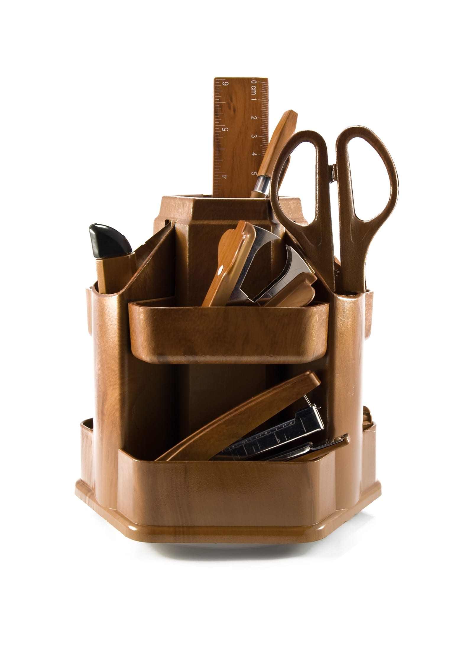 Molded plastic desk organizer holding household stationery