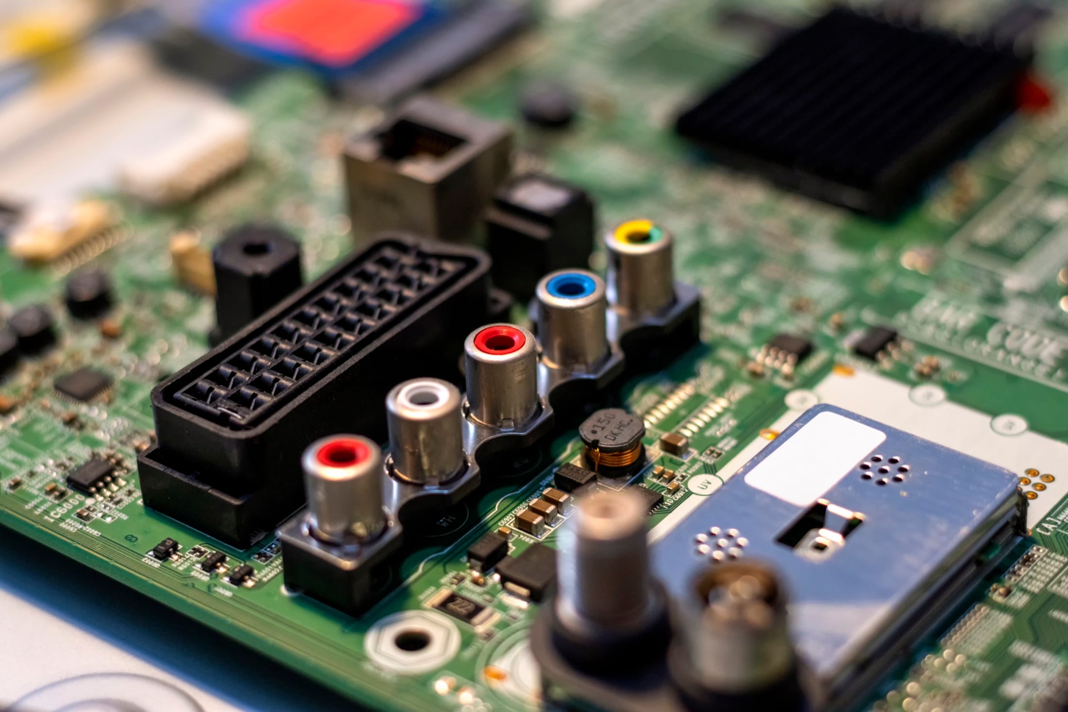 Close-up of connector housings and components on a circuit board