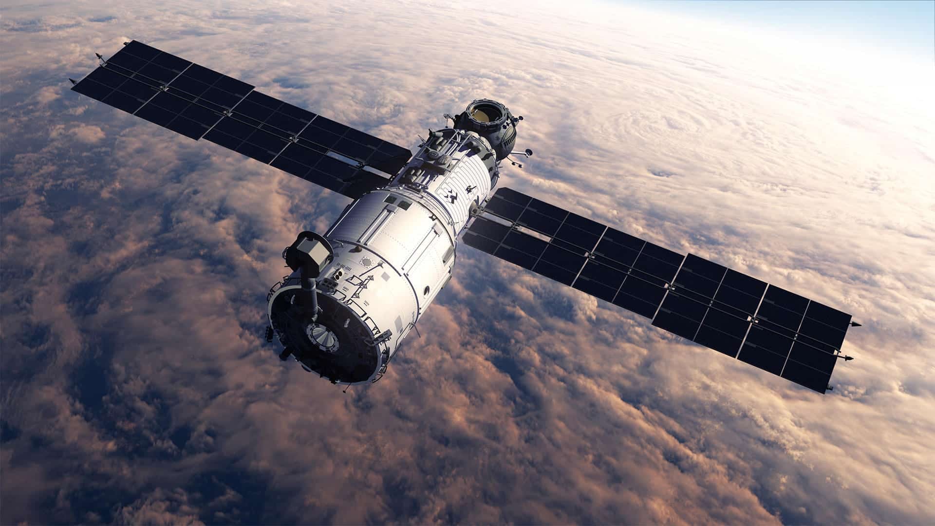 Satellite with deployed solar arrays orbiting above Earth