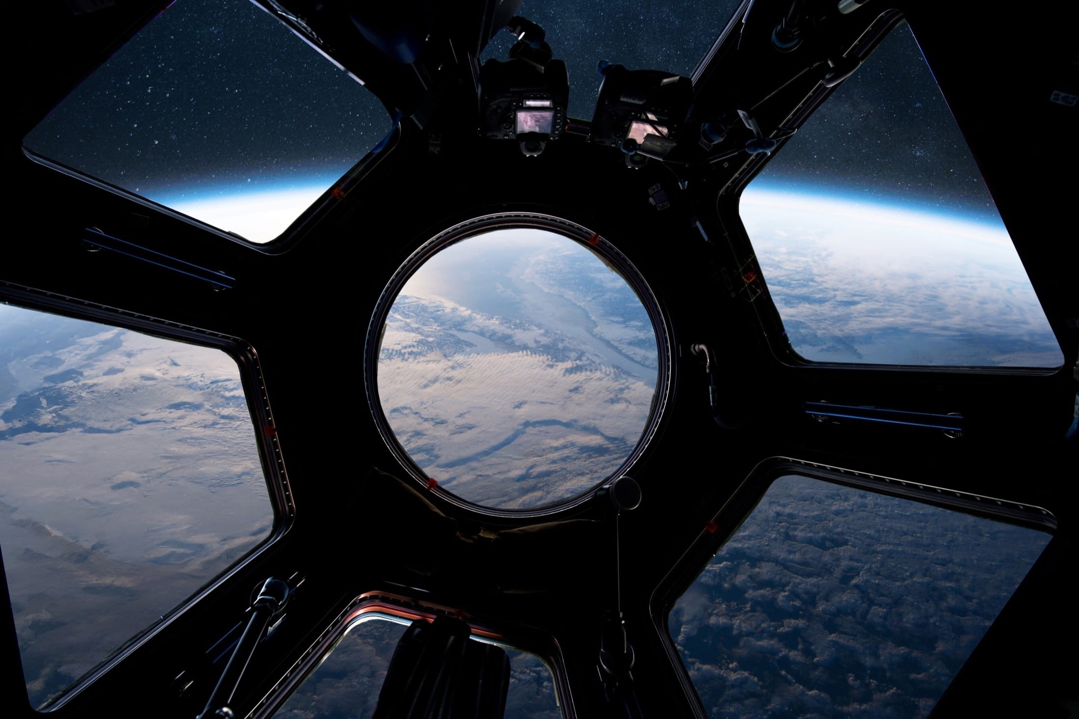 View of Earth from the cupola window of a spacecraft